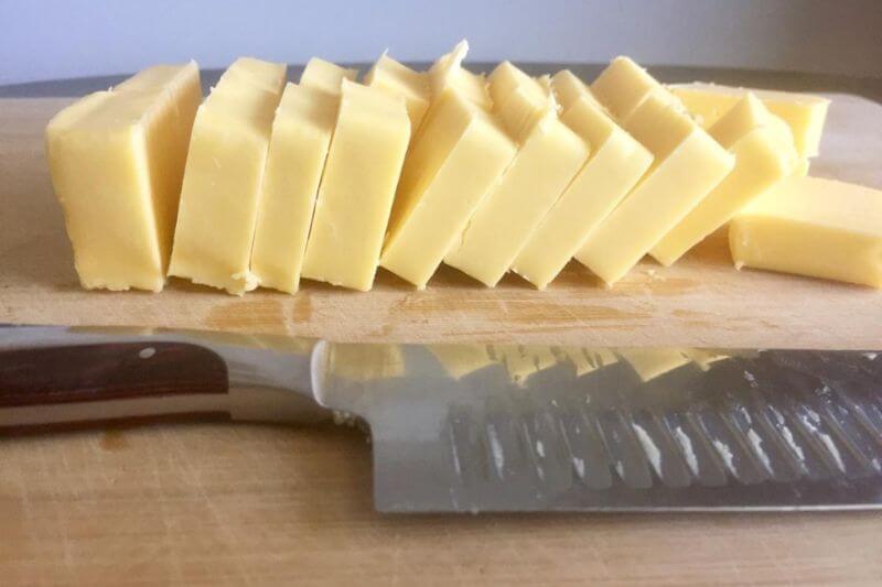 CUTTING UP RAW BUTTER